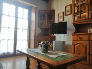 Kuchyň nebo kuchyňský kout v ubytování Apartamento amplio y con jardín Cosmos 1