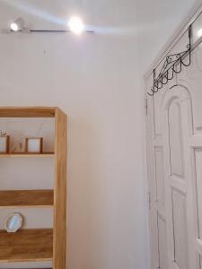 a room with a white wall and a white door at DAISY'S STAY in Hanoi +54 photos