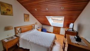 Postel nebo postele na pokoji v ubytování Apartamento Os Pineiros Cambados