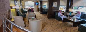 a lobby with two women sitting in a waiting room at Boudl Salmiya, Kuwait - بودل السالمية الكويت in Kuwait +38 photos