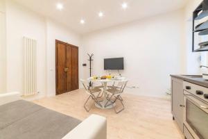 TV a/nebo společenská místnost v ubytování Gianicolo Cozy Suite
