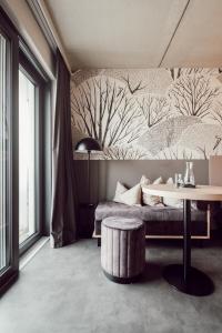 Posezení v ubytování ADEBAR Stadthotel