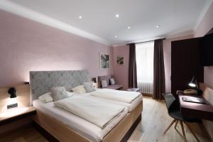 Posteľ alebo postele v izbe v ubytovaní Altstadthotel Kasererbräu