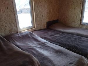 Postel nebo postele na pokoji v ubytování Bars Yurt Camp