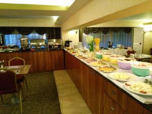 a buffet line with many plates of food on it at SARR TAC MAHAL HOTEl in Ankara