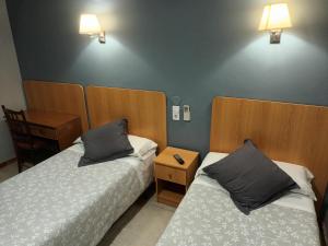 Krevet ili kreveti u jedinici u okviru objekta Hostal Can Jaume