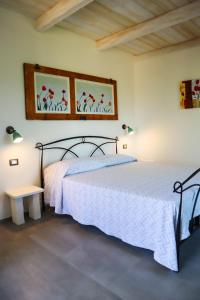 A bed or beds in a room at FicOlivo
