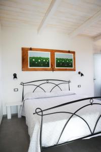A bed or beds in a room at FicOlivo
