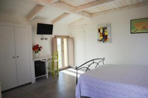 A bed or beds in a room at FicOlivo