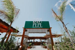 a restaurant with a sign that reads jeju perdumes at Martiness Hotel Durres in Durrës