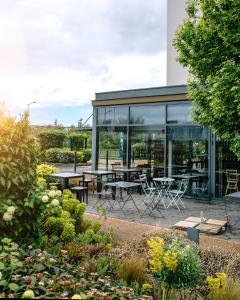 Сад в Hôtel Akena Reims Bezannes