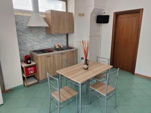 Kuchyň nebo kuchyňský kout v ubytování La Locanda