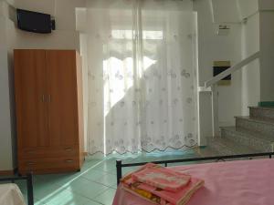 TV a/nebo společenská místnost v ubytování La Locanda + 23 fotografií