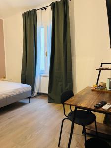 Postel nebo postele na pokoji v ubytování A Pisa con amore