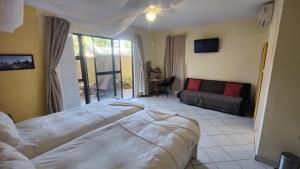 Maison Ambre Guesthouse tesisinde bir odada yatak veya yataklar +37 fotoğraf
