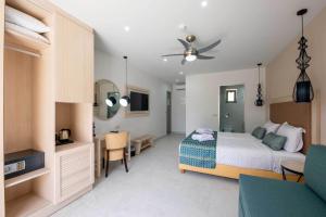 Televízia a/alebo spoločenská miestnosť v ubytovaní Sirios Village Hotel & Bungalows - All Inclusive
