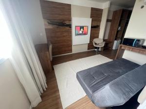 TV o dispositivi per l'intrattenimento presso Linhares Design Hotel