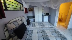 Maison Ambre Guesthouse tesisinde mutfak veya mini mutfak