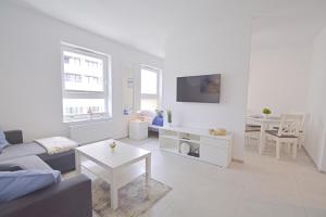 TV/Unterhaltungsangebot in der Unterkunft Sun Towers - Apartamenty Bryza - Apartamenty z parkingiem