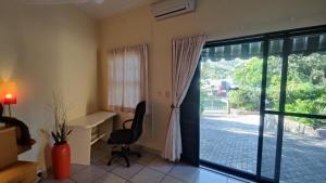 Maison Ambre Guesthouse tesisinde bir oturma alanı