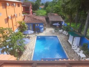 Bazén v ubytování POUSADA BELLA SPIAGGIA nebo v jeho okolí