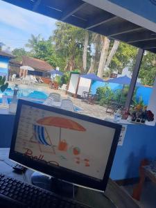 Bazén v ubytování POUSADA BELLA SPIAGGIA nebo v jeho okolí