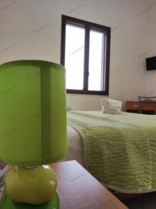 Ein Bett oder Betten in einem Zimmer der Unterkunft Calamoni22