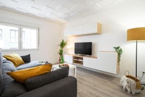 TV a/nebo společenská místnost v ubytování Apartamento San José