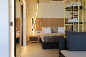 Posteľ alebo postele v izbe v ubytovaní Brilliance of Mykonos
