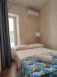 Katil atau katil-katil dalam bilik di Luxury Berto Home