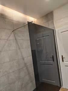 a shower with a glass door in a bathroom at Luxury Berto Home in Taormina +46 photos