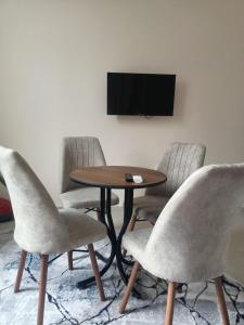 TV a/nebo společenská místnost v ubytování Grand Apart Hotel