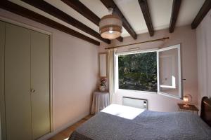 En eller flere senge i et værelse på Sabilande - Seignosse situation agréable dans quartier calme et boisé proche de la plage et du lac d'hossegor