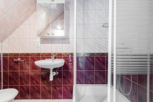 Koupelna v ubytování Pokoje i Bistro Łąkowa 5 Mikoszewo + 22 fotografií