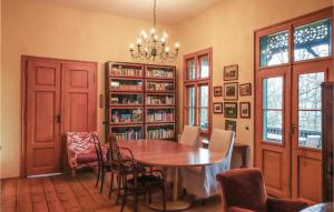 a dining room with a table and chairs at Nice Home In Igls With Wifi in Innsbruck