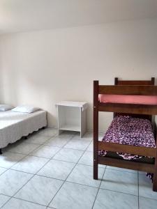 Poschodová posteľ alebo postele v izbe v ubytovaní Pousada Batista