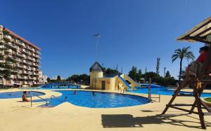 Bazén v ubytování Lovely Home Estudio Jupiter Piscina nebo v jeho okolí
