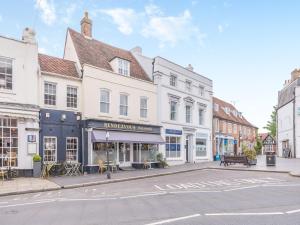 a street in a town with buildings at Gate House Apartment in Westerham