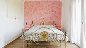Ένα ή περισσότερα κρεβάτια σε δωμάτιο στο Tuscan Orchard