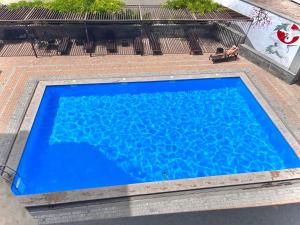 Bazén v ubytování Bien hotel nebo v jeho okolí