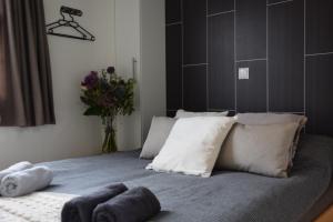 เตียงในห้องที่ Holiday Inn 30 Oisterwijk # Award 2024