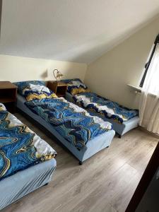 Postel nebo postele na pokoji v ubytování Gorzów Wlkp Wolne pokoje łóżka ul Wiatraczna 44