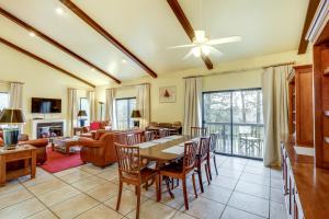 a living room with a table and chairs and a couch at Spacious Flagstaff Vacation Rental - 1 Mi to Dtwn in Flagstaff