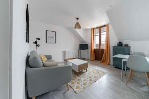 Televízia a/alebo spoločenská miestnosť v ubytovaní Residence Le Languedoc - Appartements design - Proche des parcs