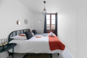 Posteľ alebo postele v izbe v ubytovaní Residence Le Languedoc - Appartements design - Proche des parcs