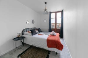 Posteľ alebo postele v izbe v ubytovaní Residence Le Languedoc - Appartements design - Proche des parcs