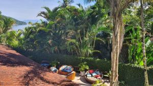 Um jardim em Pousada Tropical Araçatiba