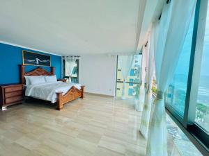 Postel nebo postele na pokoji v ubytování Beach Front Penthouse in Exclusive Tower + 39 fotografií