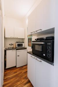 Η κουζίνα ή μικρή κουζίνα στο Cozy apartment in Ružinov