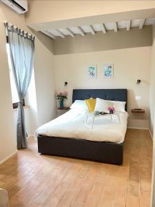 Postel nebo postele na pokoji v ubytování B&B La Fenice